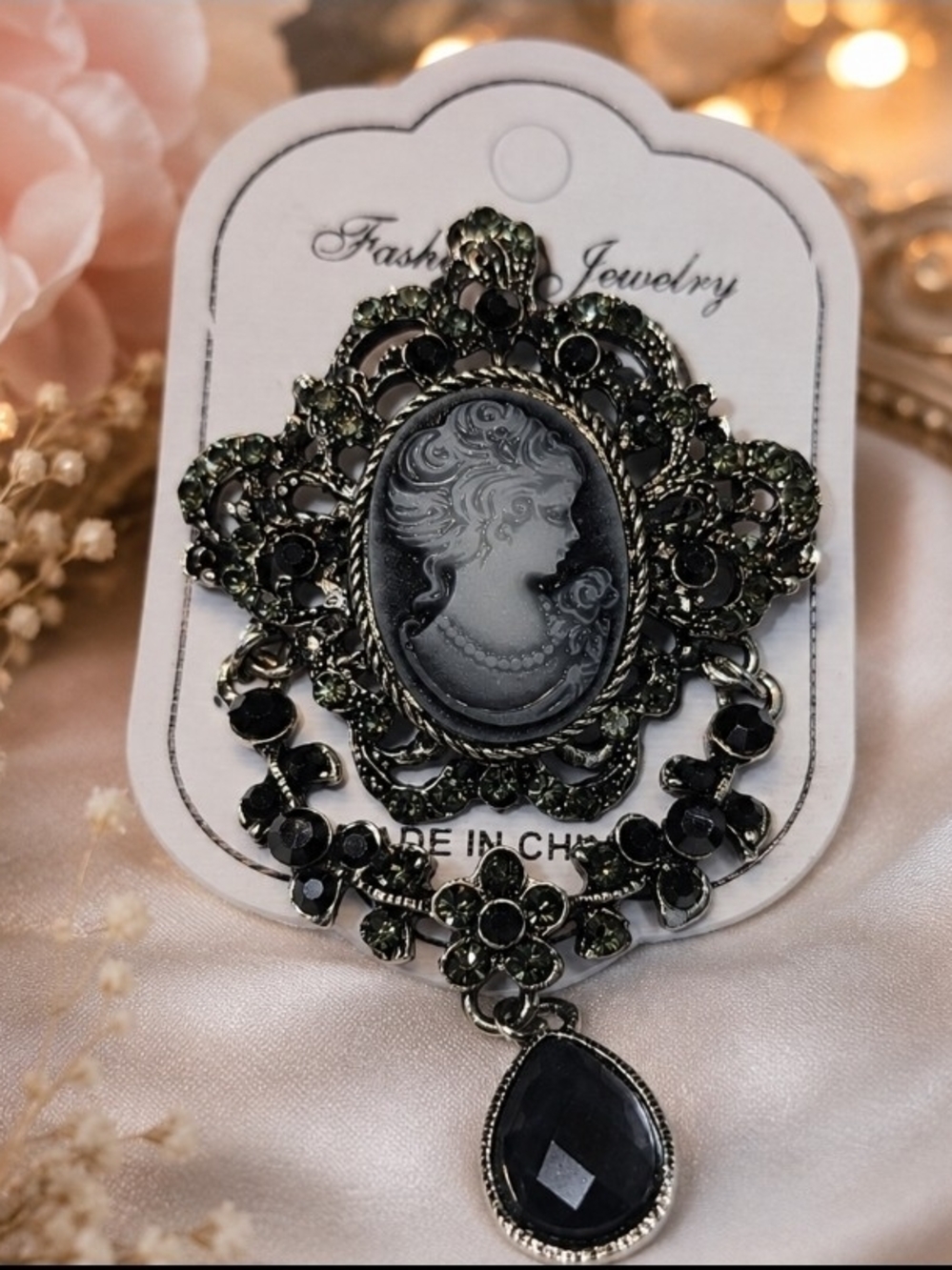 Black and Silver Cameo Brooch with Teardrop Charm